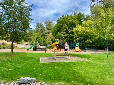 Playground and picnic table at Enchantment Park