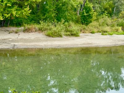 Quiet sandy beach on Blackbird Island