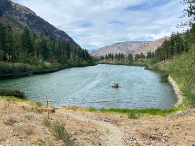 Walking along the dam at Antilon Lake