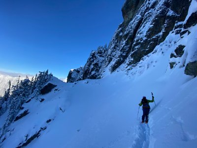 Tim skinning to the start of the Circus Couloir