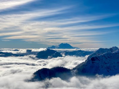 Mount Rainier towering above the clouds