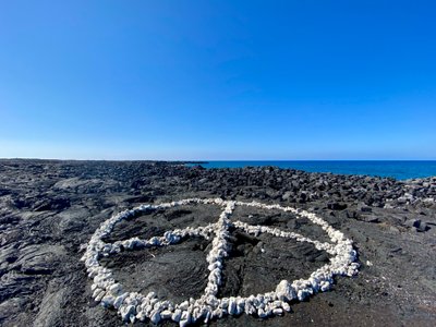 Coral peace sign