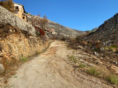 Rough section of Via del Semaforo with abandoned buildings