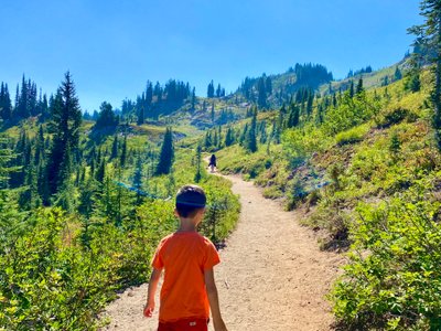My son walking along the North side of Naches Peak