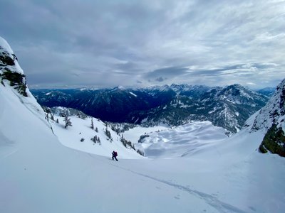 Stefan skinning up to the Northern Ridge of Chair Peak