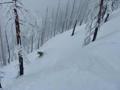 Tim skiing off the ridge